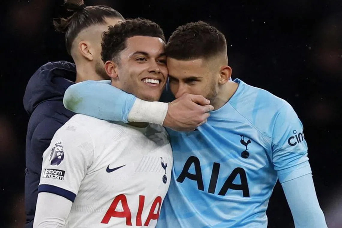 Soccer Football - Premier League - Tottenham Hotspur v Brighton & Hove Albion - Tottenham Hotspur Stadium, London, Britain - February 10, 2024 Tottenham Hotspur's Brennan Johnson and Guglielmo Vicario celebrate after the match Action Images via Reuters/Andrew Couldridge