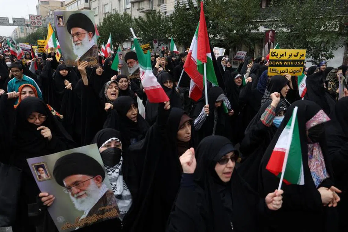 Iranians attend a rally in support of Palestinians, in Tehran, Iran, October 13, 2023. Majid Asgaripour/WANA (West Asia News Agency) via REUTERS.
