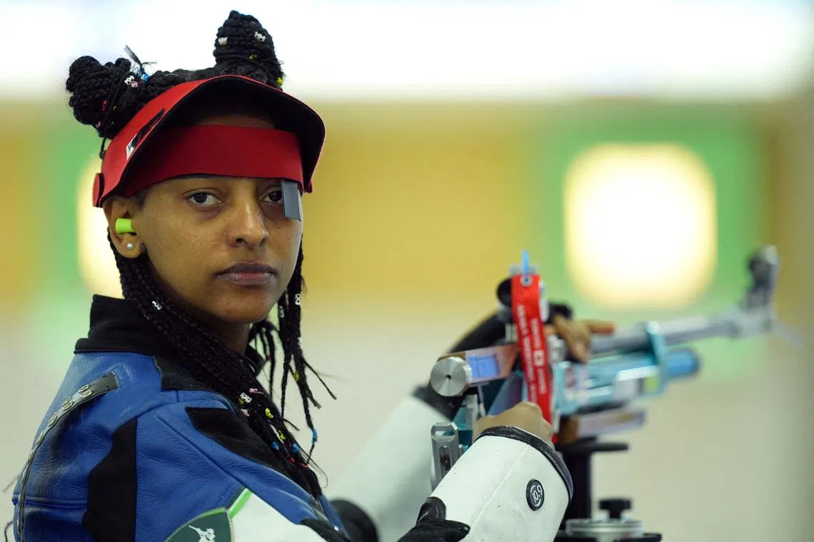 PARIS 2024 OLYMPICS - Shooting - 10m Air Rifle Women's Qualification - Chateauroux Shooting Centre, Dols, France - July 28, 2024. Luna Solomon of Refugee Olympic Team in action. REUTERS/Amr Alfiky