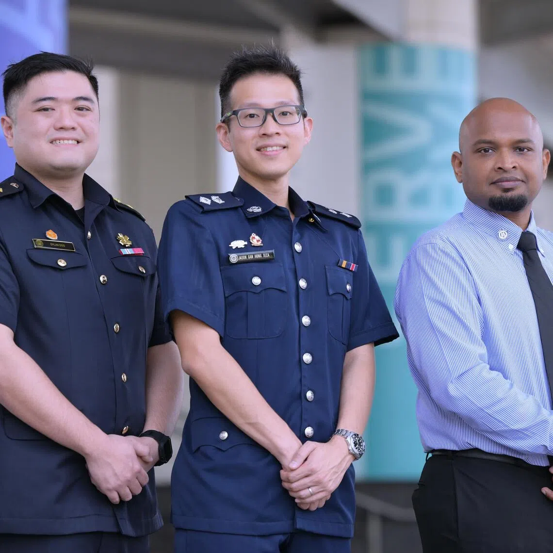 (From left) Lieutenant Dylan Doo from the Singapore Civil Defence Force Central Fire Station, Deputy Superintendent of Police Gan Hong Teck and HTX engineer Muhammad Anwar Jalil.