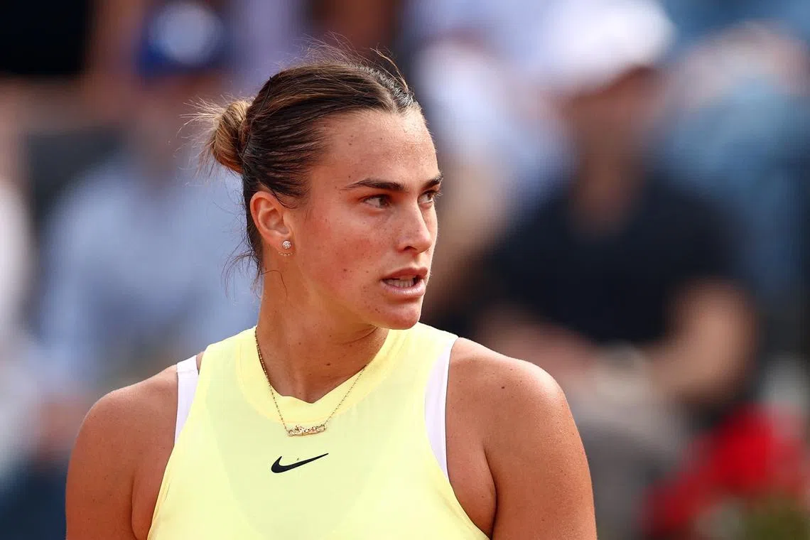 FILE PHOTO: Tennis - Italian Open - Foro Italico, Rome, Italy - May 18, 2024 Belarus' Aryna Sabalenka reacts during her final match against Poland's Iga Swiatek REUTERS/Guglielmo Mangiapane