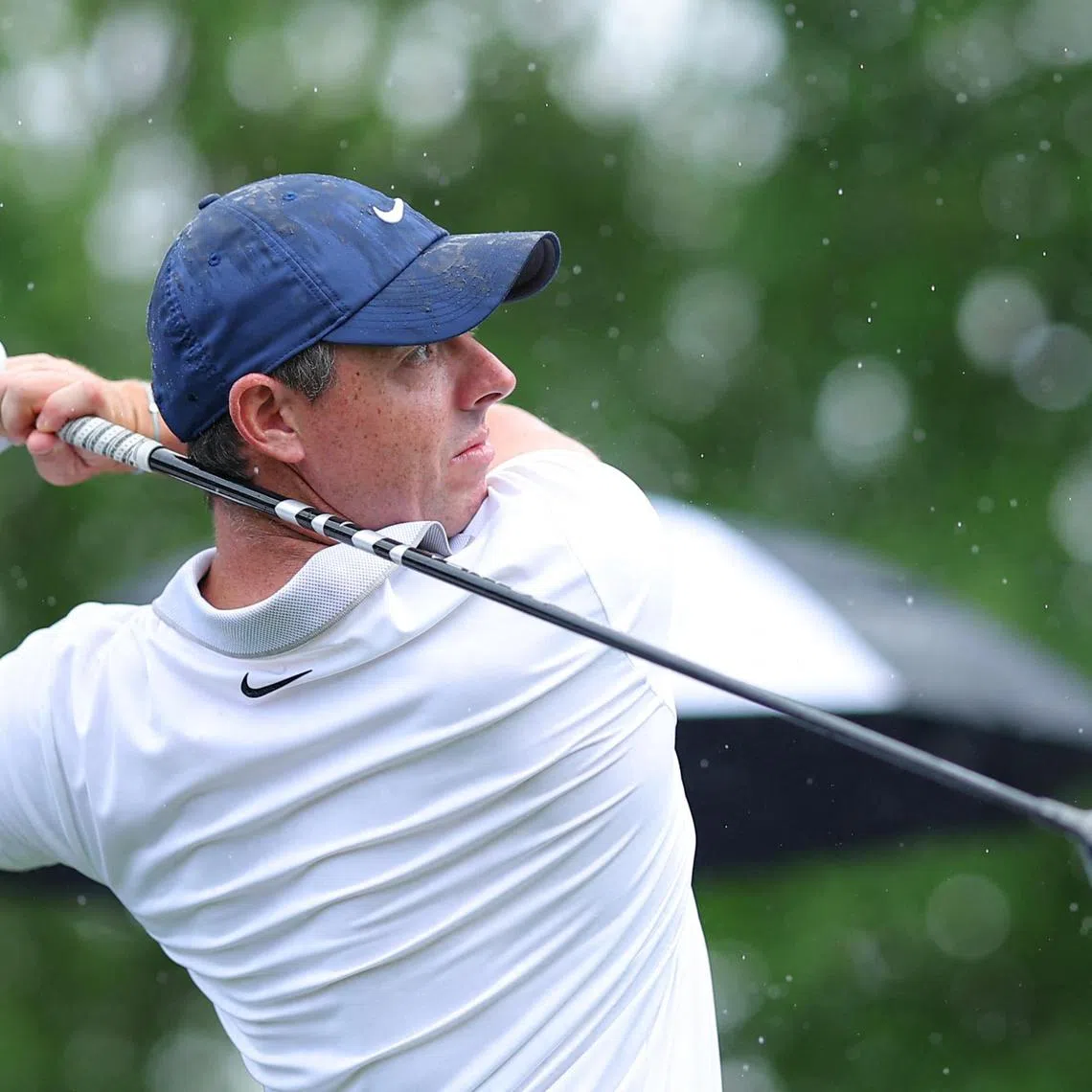 Rory McIlroy of Northern Ireland playing his shot from the third tee prior to the PGA Championship at Quail Hollow Country Club on May 13, 2025 in Charlotte, North Carolina.   