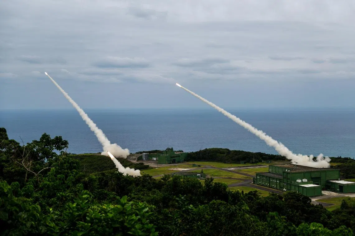 Taiwan's military firing missiles from the High Mobility Artillery Rocket Systems (Himars) during a drill in Pingtung on May 12.