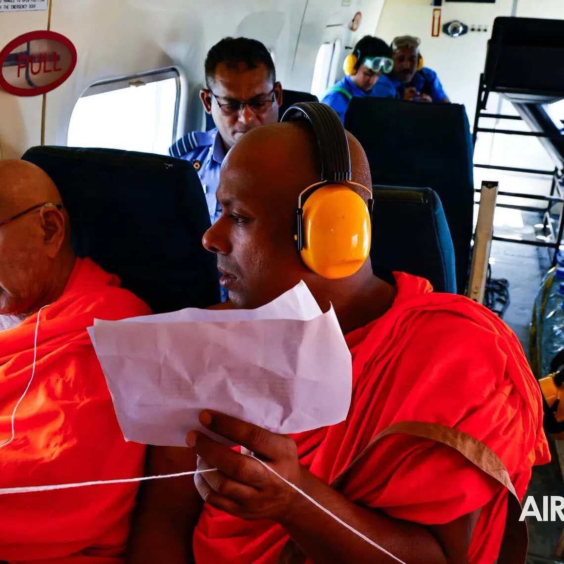 The saffron-robed monks chanted prayers during the evening of Sept 19’s flight invoking the gods to end the drought.