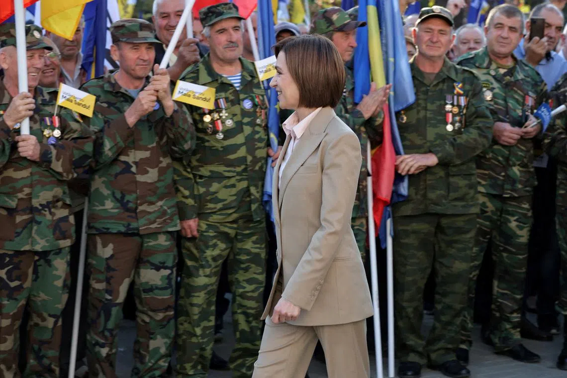 FILE PHOTO: Moldovan incumbent President and candidate in the upcoming presidential election Maia Sandu attends a campaign rally in Chisinau, Moldova September 20, 2024. REUTERS/Vladislav Culiomza/File Photo