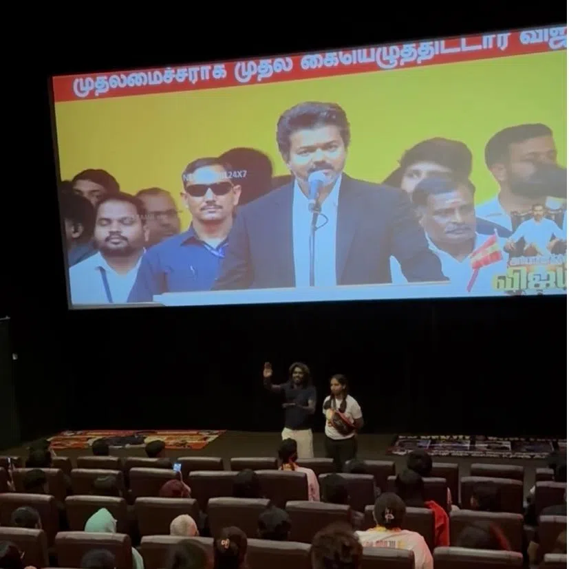 Fans collecting tickets to view the Malaysia Vijay Fan Club's Live Streaming of the Swearing In Ceremony at a Cinema hall in Selangor.