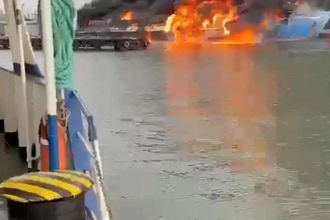 Smoke and flames rise from a ferry following a fire at the port of Kavkaz, in the course of Russia-Ukraine conflict, as seen from Chushka, Krasnodar region, Russia, August 22, 2024, in this  screengrab taken from a social media video. Social Media/via REUTERS