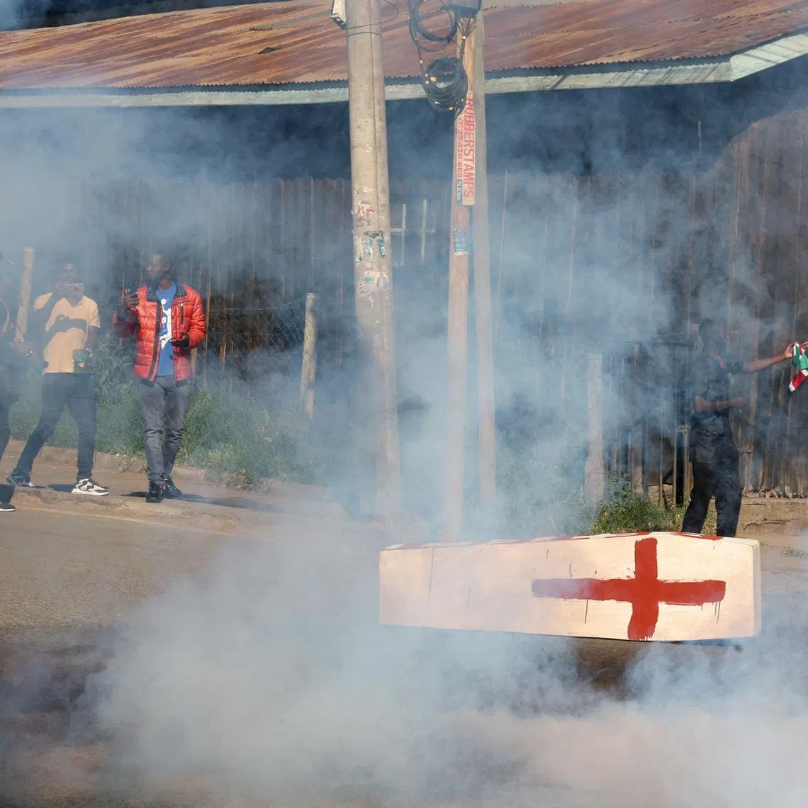 Demonstrators take part in a protest on June 9 against a US-backed Ebola quarantine plan to establish a 50-bed facility at a Kenyan air force base intended to host Americans exposed to Ebola.
