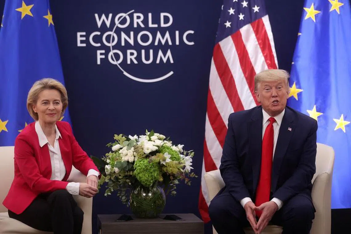 FILE PHOTO: Then-U.S. President Donald Trump speaks dutring a bilateral meeting with European Commission President Ursula von der Leyen during the 50th World Economic Forum (WEF) annual meeting in Davos, Switzerland, January 21, 2020. REUTERS/Jonathan Ernst/File Photo