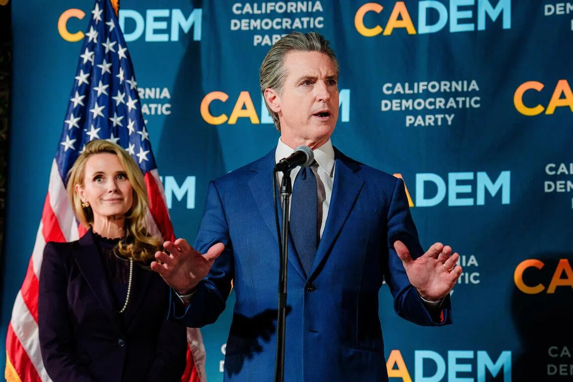 California Governor Gavin Newsom and his wife, Mrs Jennifer Siebel Newsom, hold a press conference after Proposition 50 passed.