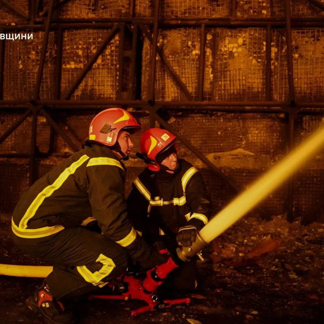 Firefighters work at the site of a natural gas production facility which was hit by Russian drone and missile strikes, amid Russia's attack on Ukraine, in Poltava region, Ukraine May 5, 2026. Press service of the State Emergency Service of Ukraine in Poltava region/Handout via REUTERS