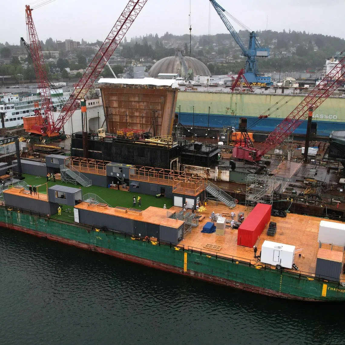 A drone view of a barge containing the Seattle Soccer Celebration floating pitch under construction at Everett Ship Repair in Everett, Washington, U.S., June 4, 2026. REUTERS/Matt Mills McKnight