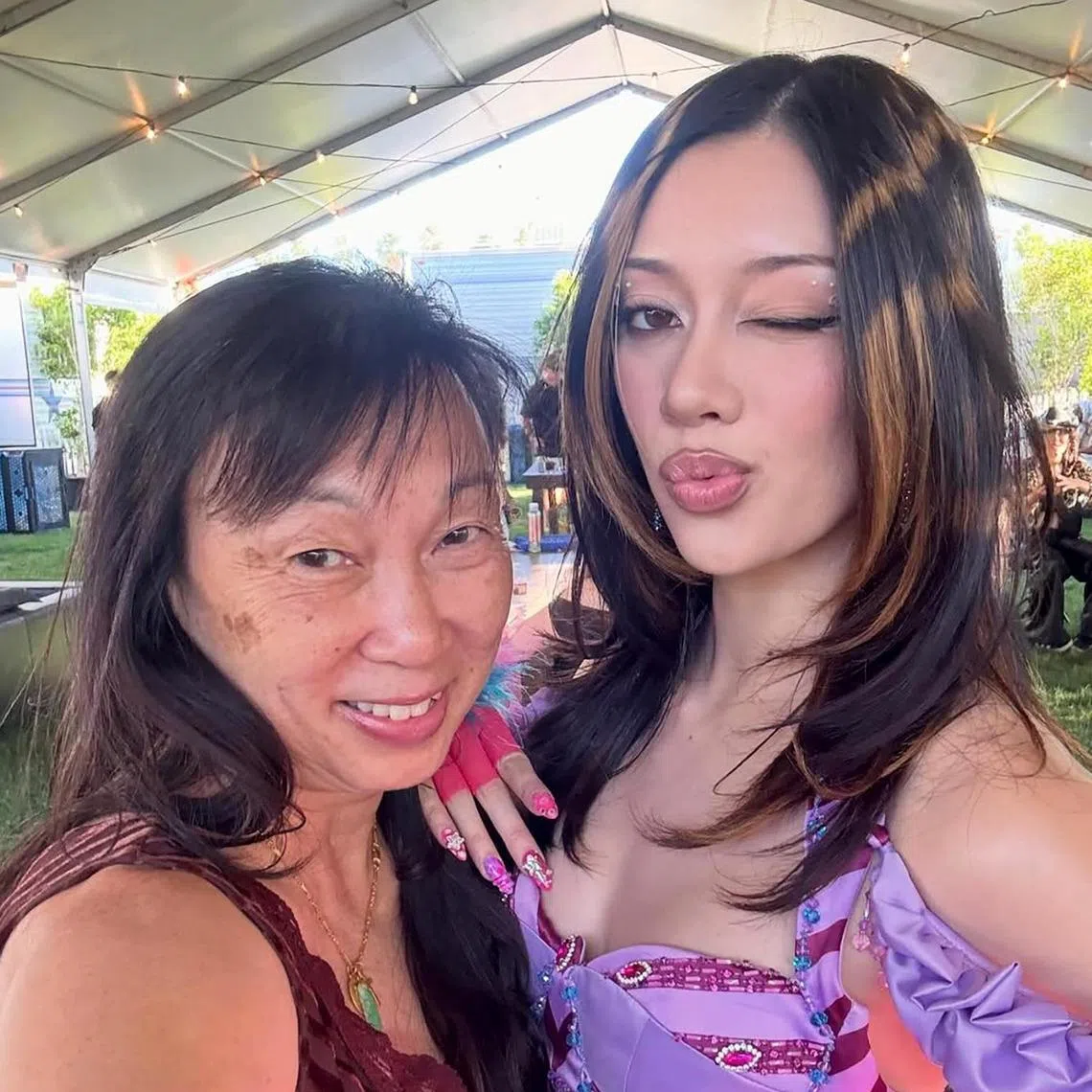 Katseye's Megan Skiendiel with her Singaporean mother, Sylvia Lee, at the first weekend of music festival Coachella 2026.