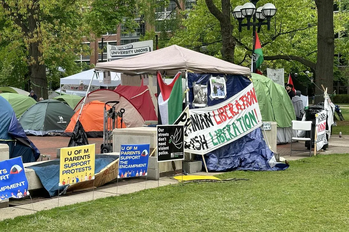 bgarab - ANN ARBOR (Michigan) - Pro-Palestinian students staged demonstrations, sit-ins and set up camps at the  University of Michigan to protest the invasion of Gaza by Israel. The month-long encampment was broken up by police on May 21, 2024 who said it posed a threat to public safety. The protesters had demanded that the school’s endowment stop investing in companies with ties to Israel but the university insists it has no direct investments there and only a tiny fraction invested in funds that might include companies in Israel.

ST PHOTO: BHAGYASHREE GAREKAR