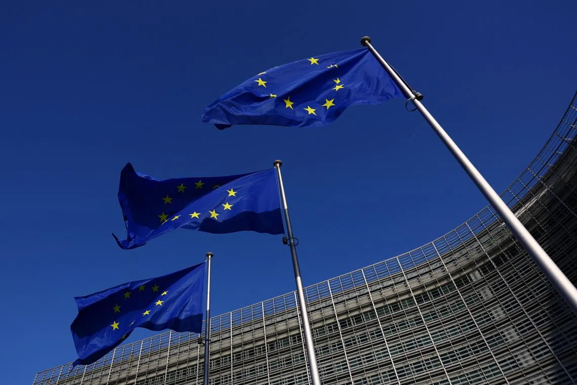European Union flags flutter outside the European Commission headquarters in Brussels, Belgium Februrary 26, 2026. REUTERS/Yves Herman