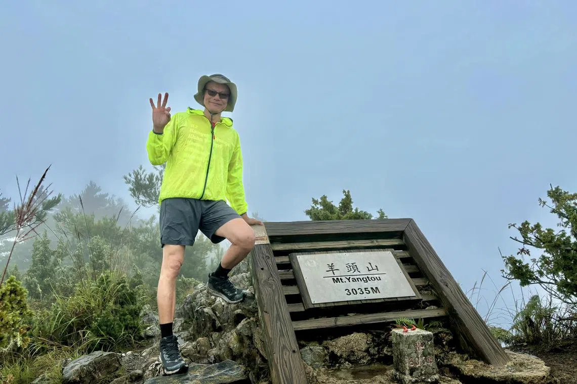 Singaporean adventurer Khoo Swee Chiow, 60, scaled his 300th peak when he climbed Taiwan's Mount Yangtou in mid-September.