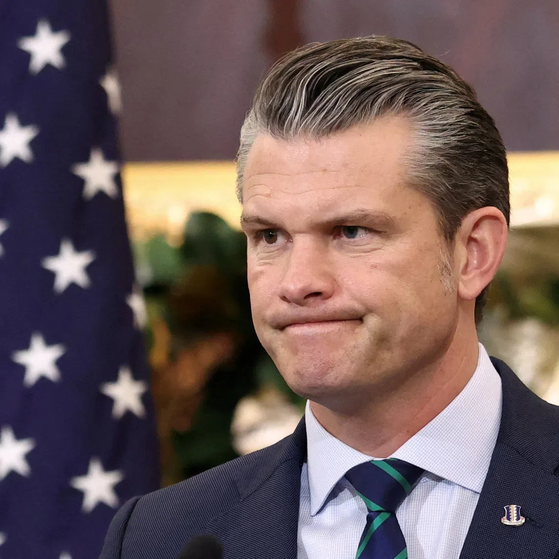 U.S. Secretary of Defense Pete Hegseth listens to remarks during the Australia-United States Ministerial Consultations (AUSMIN) at the  State Department in Washington, D.C., U.S., December 8, 2025. REUTERS/Kevin Lamarque