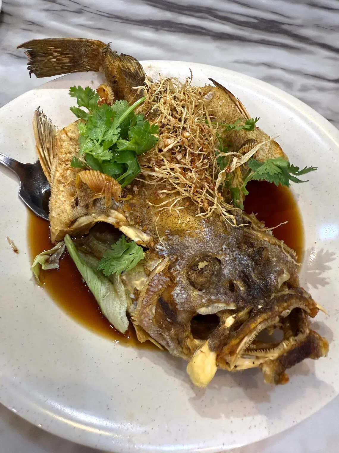 For a fee, Fatty Fong Seafood Restaurant cooks wildcaught fish brought by customers.