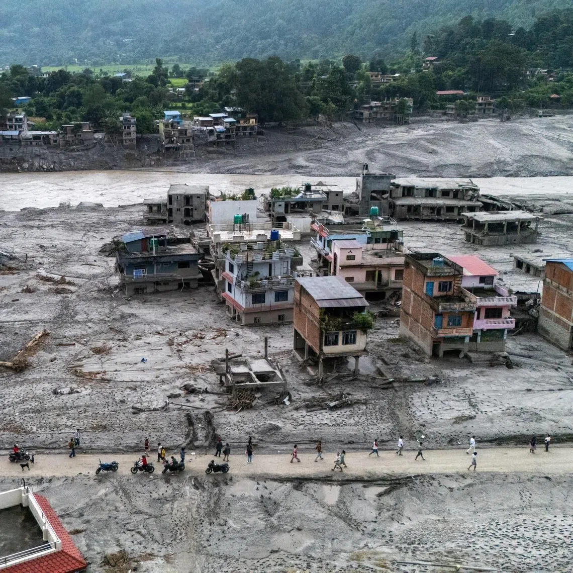 Nearly 3,000 people are still missing in Nepal and Tibet after a devastating flood tore through a border region.