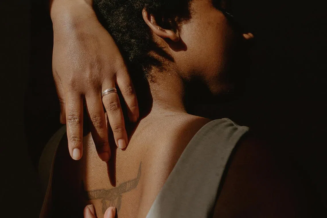 A woman stretches in New York, Jan. 16, 2022. Given how common muscle knots are, nearly every human has them, surprisingly little is known about them, experts said. 