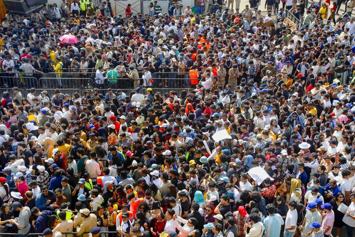 Fans throngingNarendra Modi Stadium in Ahmedabad for a Coldplay concert on Jan 25. 