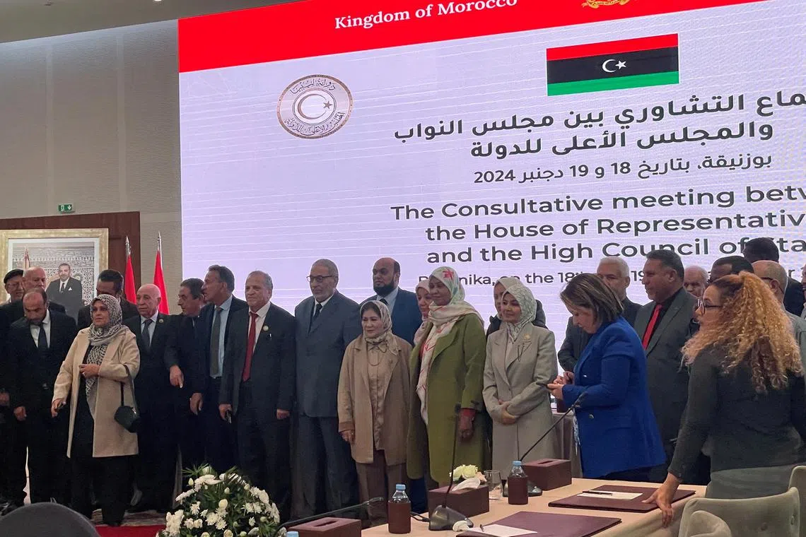 FILE PHOTO: Members of Libyan legislatures known as the High Council of State, based in Tripoli in the country's west, and the House of Representatives, based in Benghazi in the east, meet for talks in Bouznika, Morocco, December 19, 2024. REUTERS/Ahmed Eljechtimi/File Photo