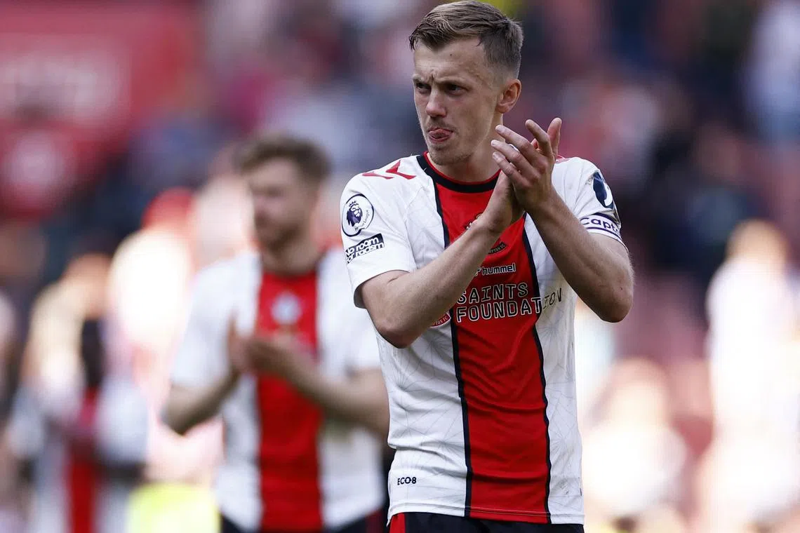 Southampton captain James Ward-Prowse cuts a dejected figure after the Saints were relegated from the Premier League following a 2-0 loss to Fulham on Saturday. 