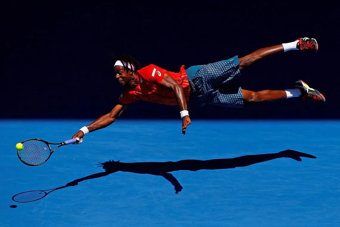 Fantastic flight: France's Gael Monfils takes off in search of the ball during the 2016 Australian Open. 