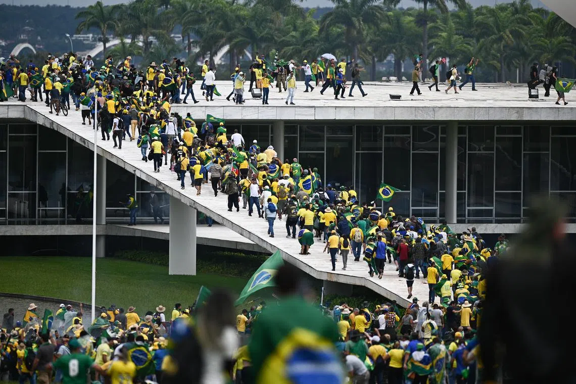 Former president Jair Bolsonaro's supporters storm the National Congress in Brazil on Jan 8, 2023.