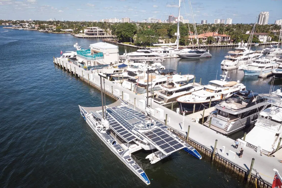 A view of the Energy Observer, the first hydrogen-powered, zero-emission vessel to be self-sufficient in energy, while moored at Pier Sixty Six Marina in Fort Lauderdale, Florida, on February 27, 2024. Marco BELLO. The Energy Observer, powered completely by renewable energy, including hydrogen produced onboard, is docked in Florida this week as it prepares to finish the last leg of its voyage around the world. The 100-foot (30.5 meter) catamaran has traveled some 63,040 nautical miles without using fossil fuels since it launched from France in 2020. (Photo by Marco BELLO / AFP)