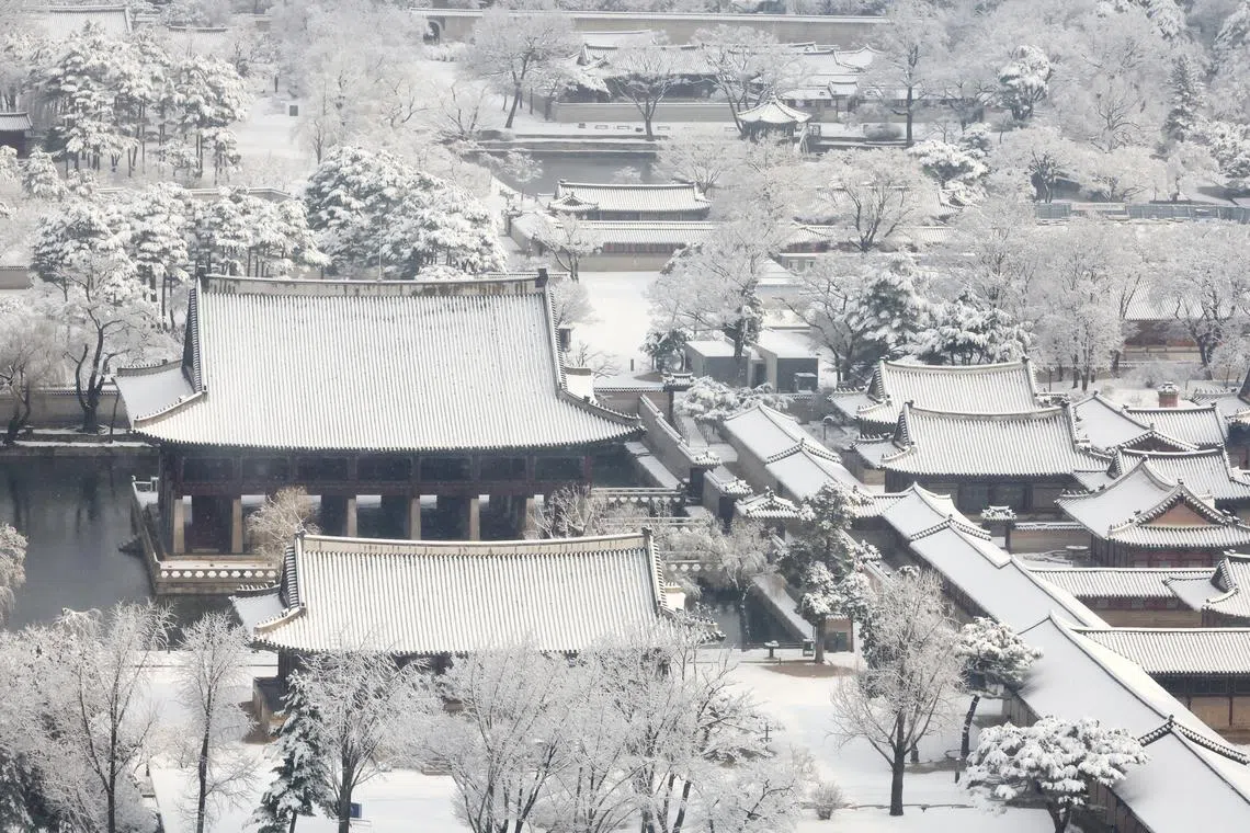 Snowfall over Gyeongbok Palace, amid a heavy snow advisory issued for the capital, Seoul, South Korea, Mar 18, 2025. 