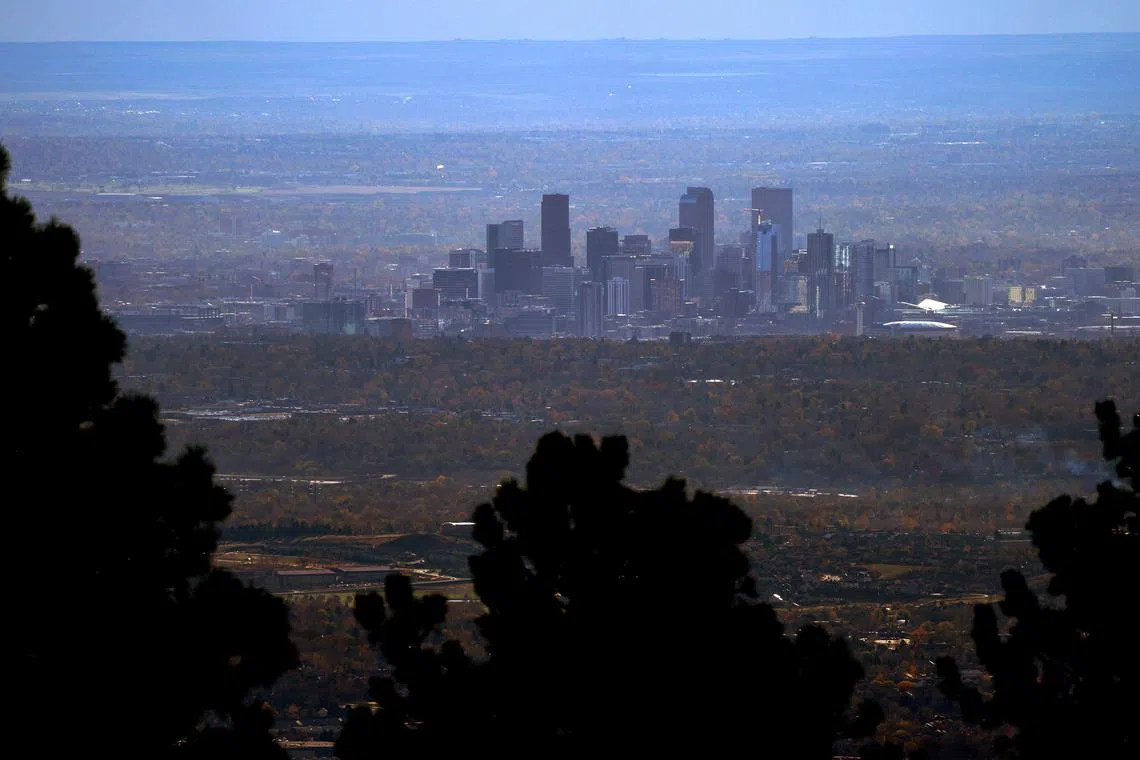 FILE PHOTO: The city skyline is seen from the mountains looking east in Denver, Colorado, U.S., November 4, 2017. REUTERS/Rick Wilking/File Photo