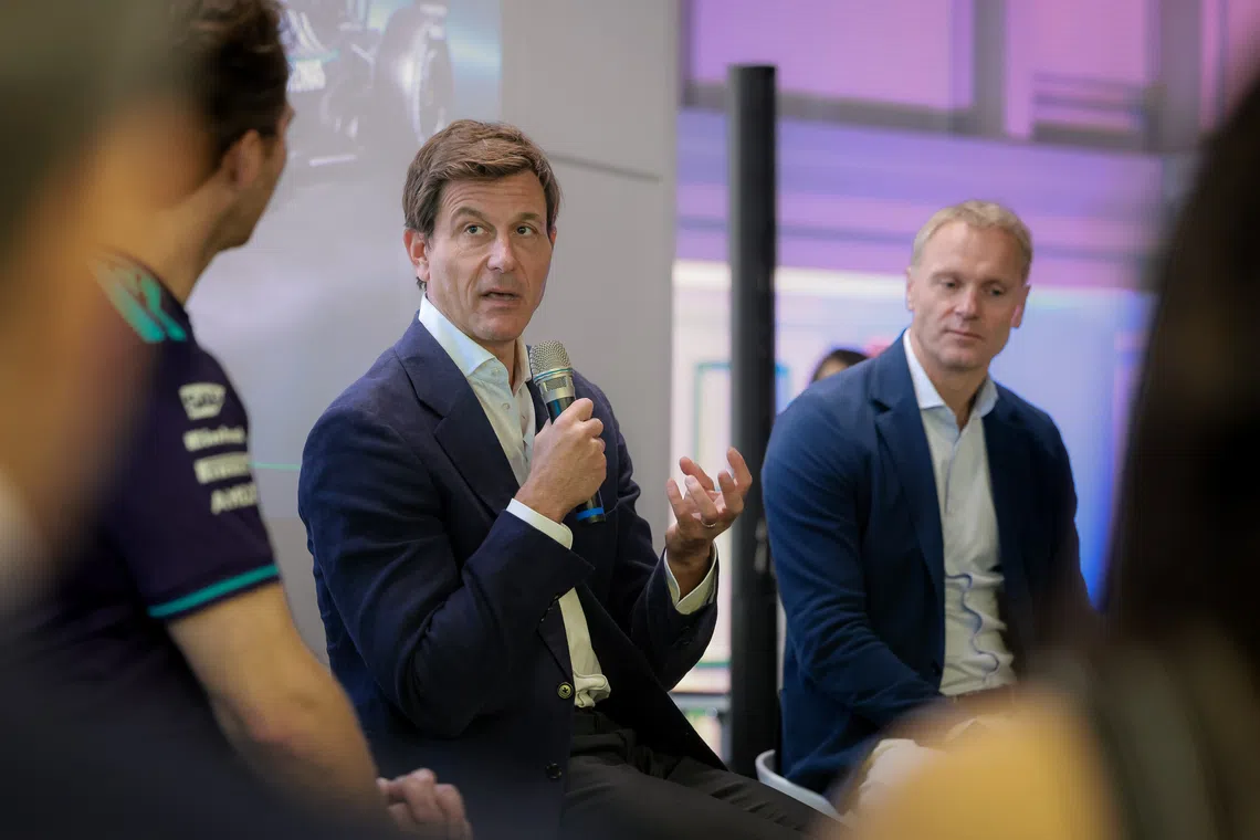 Mercedes-AMG Petronas Formula One Team team principal Toto Wolff (left) and Signify chief executive officer As Tempelman (right) speak during a fireside chat at the Philips APAC Center.