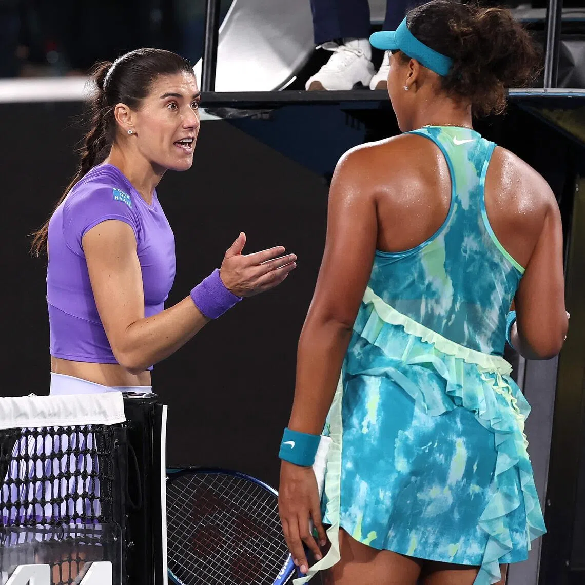 Naomi Osaka's (R) second-round win against Sorana Cirstea was marred by a testy exchange and icy handshake at the end.