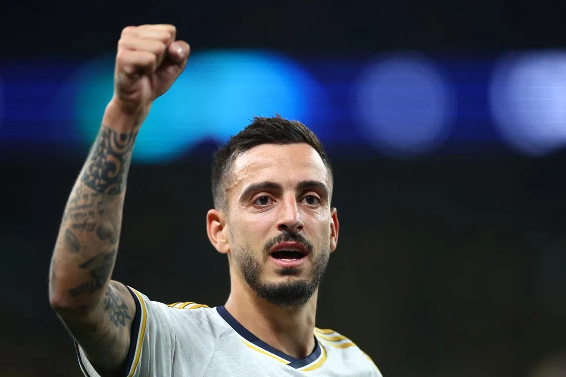 FILE PHOTO: Soccer Football - Champions League - Final - Borussia Dortmund v Real Madrid - Wembley Stadium, London, Britain - June 1, 2024 Real Madrid's Joselu celebrates after winning the Champions League final REUTERS/Hannah Mckay/File Photo