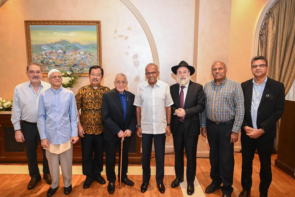 (From left) Mr Nash Benjamin, president of the Jewish Welfare Board, Muslim representative Ameerali Abdeali, Christian representative Terry Kee, Zoroastrian representative Ervad Rustom Ghadiali, Law and Home Affairs Minister K. Shanmugam, Chief Rabbi of Singapore Mordechai Abergel, Hindu representative Sengkuttuvan Kanniyappan, and Baha'i representative K. Elango, at the Jacob Ballas Centre during a pre-celebration of Passover on April 11.