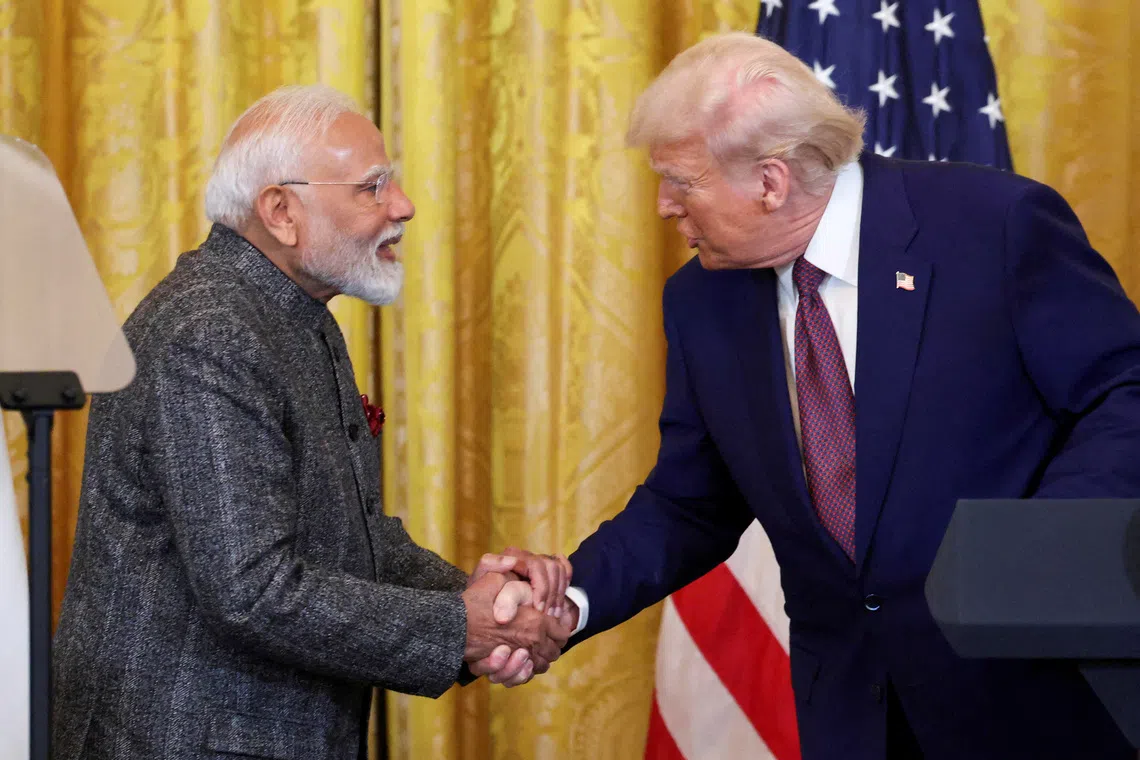 For months, Indian Prime Minister Narendra Modi (left) resisted US pressure.
