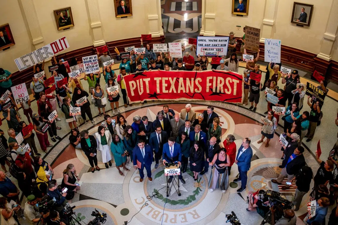 Democratic Texas Representative Gene Wu speaks during a press conference after the passing of H.B. 4, during a session in which Democratic lawmakers, who had left the state to prevent Republicans from redrawing Texas's 38 congressional districts, returned to the Texas State Capitol in Austin, Texas, U.S., August 20, 2025. REUTERS/Sergio Flores