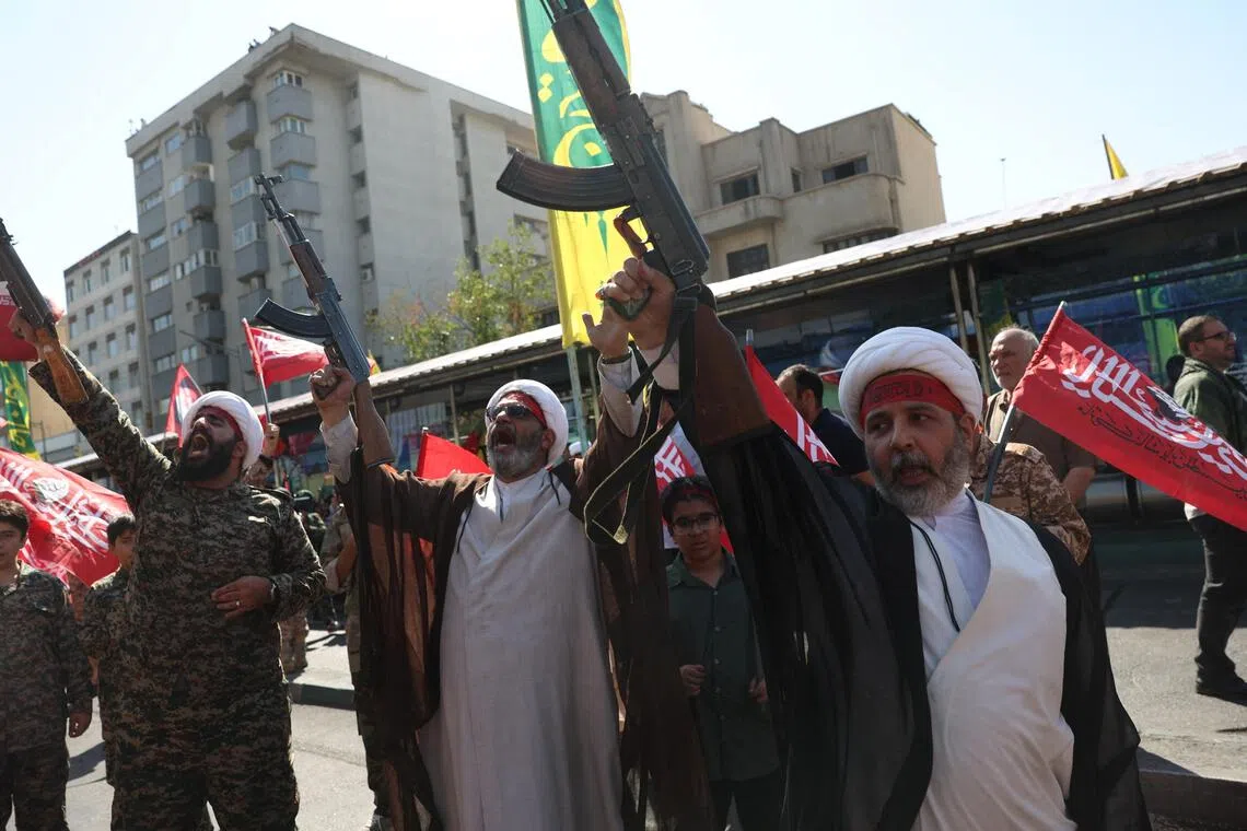 Iran’s Guards threaten to hit new targets with new weapons if US attacks