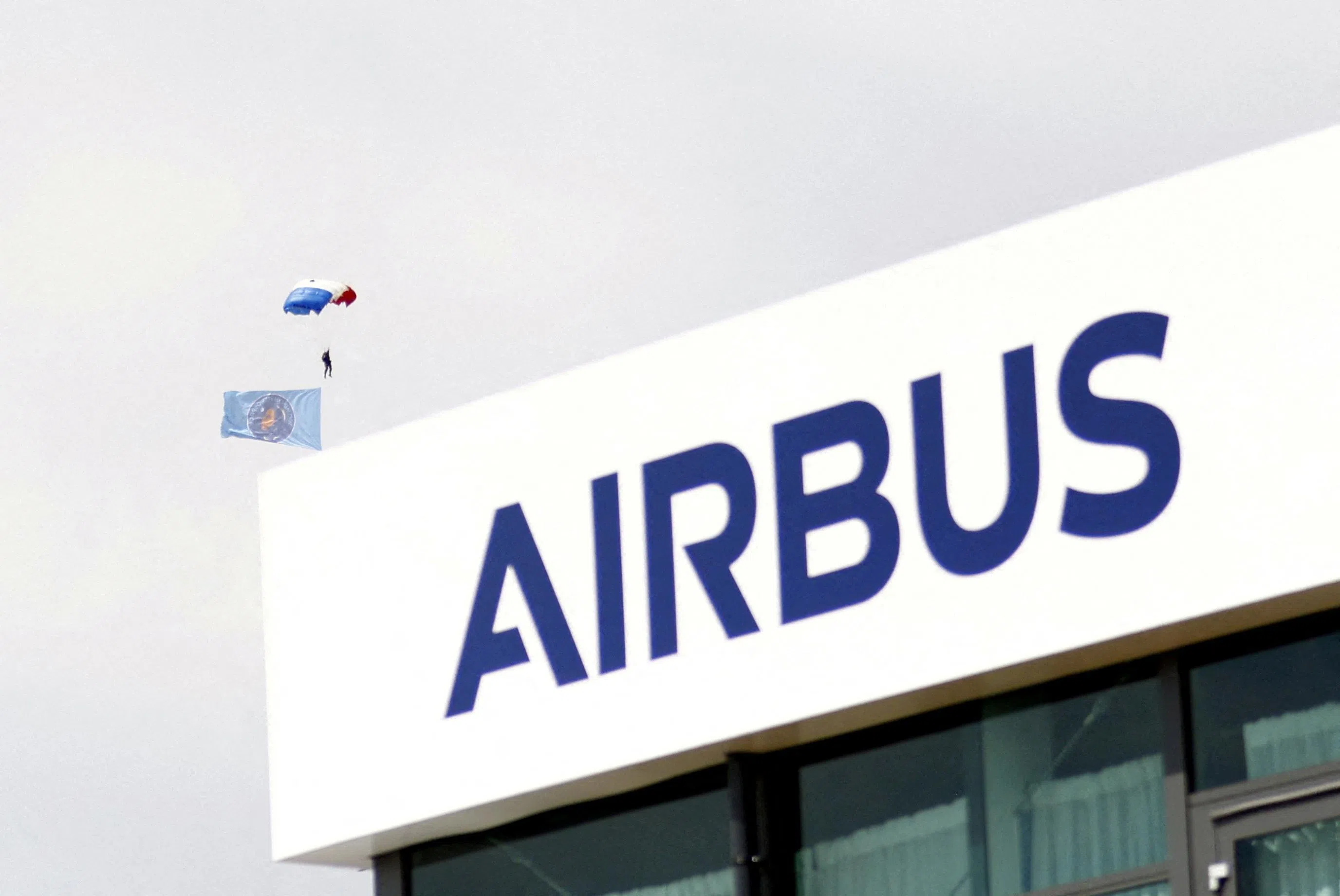 FILE PHOTO: The Airbus logo at the company's pavilion during the 55th edition of the International Paris Air Show at the Paris-Le Bourget Airport, in Le Bourget, near Paris, France, June 20, 2025. MOHAMMED BADRA/Pool via REUTERS/File Photo