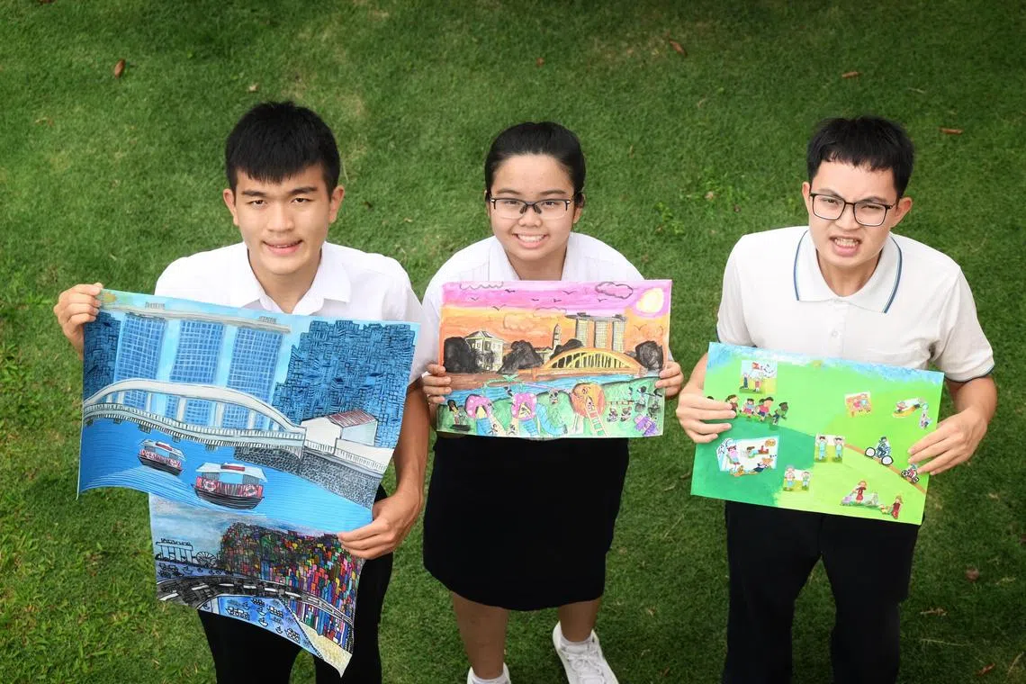 From left: Pathlight School students Marcus Goh, Nurdaanya Mohamed Hafiz and Brennan Tay with their respective artwork, part of a total of 30 artwork that are selected in the Wing Tai X Pathlight School art competition to be displayed on a construction hoarding along Kim Seng Linear Park, on July 11, 2025.