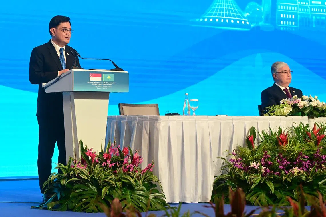 DPM Heng Swee Keat, joined by Kazakh President Kassym-Jomart Tokayev , addressing the Kazakhstan-Singapore Business Forum on May 23.