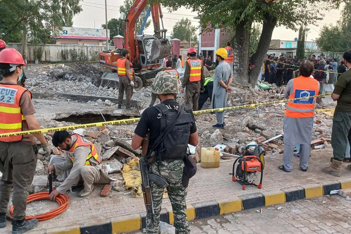 Rescue workers clear the rubble from a damaged mosque, after a suicide blast in Hangu, Pakistan September 29, 2023. REUTERS/Stringer