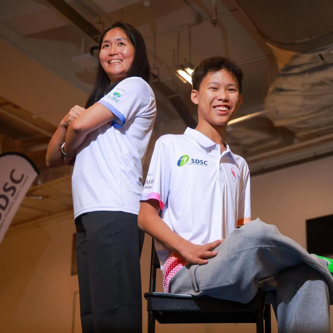 NextGen Para Talent programme cyclist Amelia Tan (left) and swimmer Elliot Goh were among those unveiled on Sept 1.