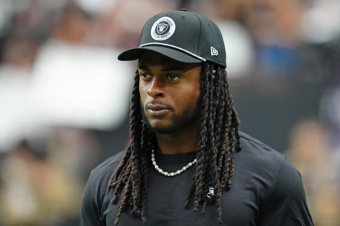 FILE PHOTO: Sep 29, 2024; Paradise, Nevada, USA; Las Vegas Raiders wide receiver Davante Adams (17) walks the sideline before the start of a game between the Raiders and the Cleveland Browns at Allegiant Stadium. Mandatory Credit: Stephen R. Sylvanie-Imagn Images/File Photo