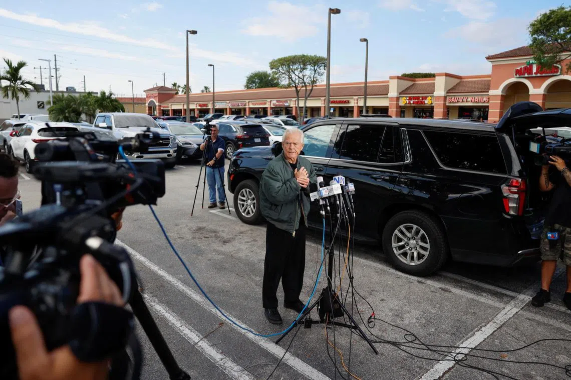 Peter Navarro talks to the media before turning himself in to start his prison sentence for contempt of Congress.