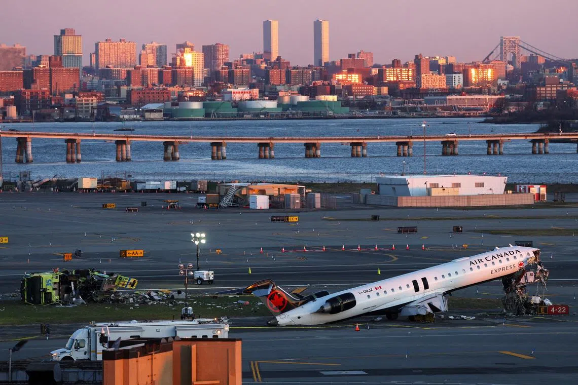 The wreckage of an Air Canada Express jet that collided with a ground vehicle on Monday at New York's LaGuardia Airport in Queens, New York, U.S., March 24, 2026.