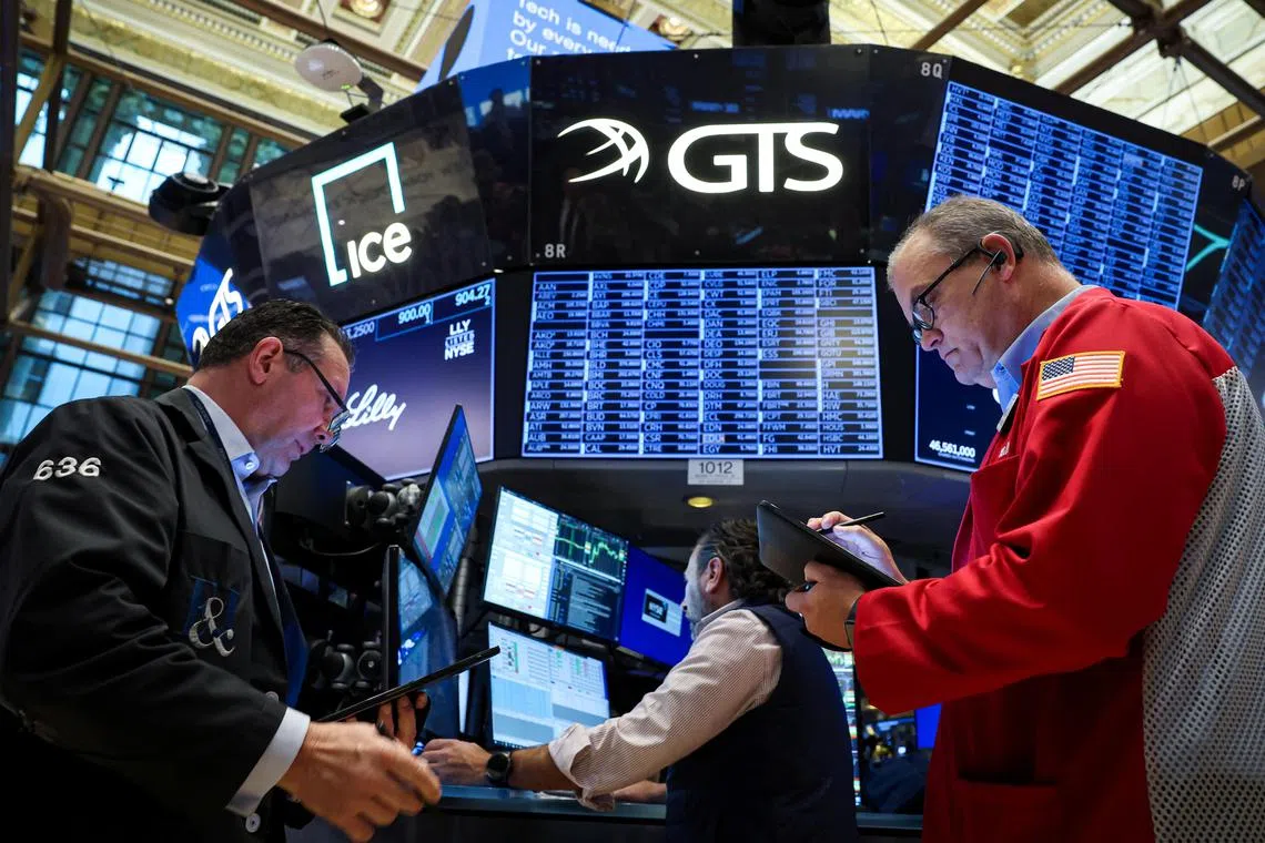 Traders working on the floor at the New York Stock Exchange, in New York City.