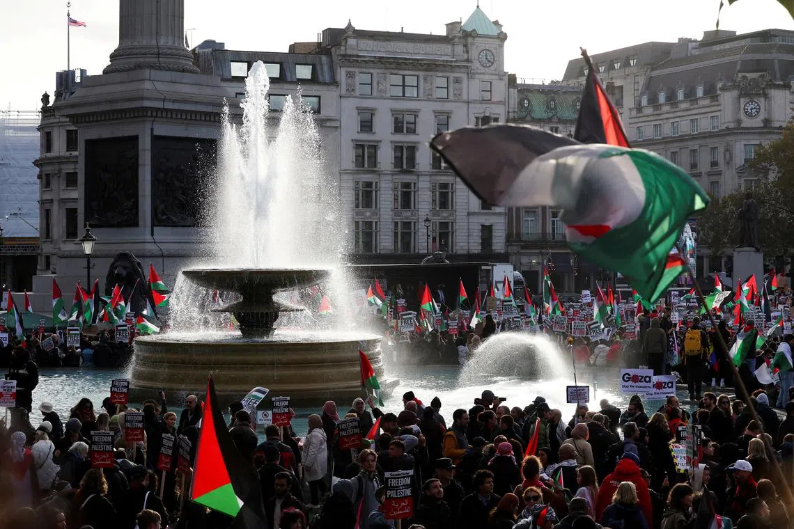 Demonstrators protest in solidarity with Palestinians in Gaza, at Trafalgar Square in London, on Nov 4.