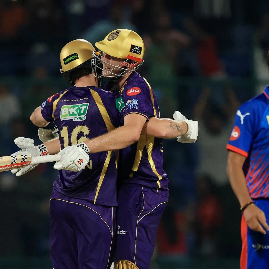 Cricket - Indian Premier League - IPL - Delhi Capitals v Kolkata Knight Riders - Arun Jaitley Stadium, New Delhi, India - May 8, 2026 Kolkata Knight Riders' Finn Allen celebrates after reaching his century and winning the match with Cameron Green REUTERS/Adnan Abidi